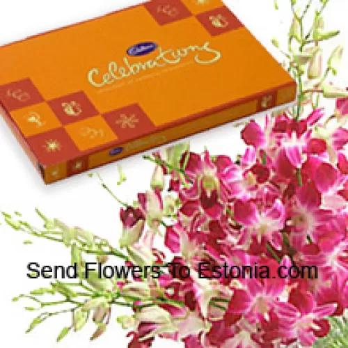 一束美丽的粉色兰花，配上一盒美丽的嘉士伯巧克力