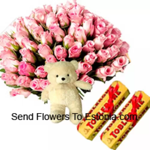 Bündel von 75 pinkfarbenen Rosen mit saisonalen Füllstoffen, einem niedlichen Teddybären und Toblerone-Schokoriegeln